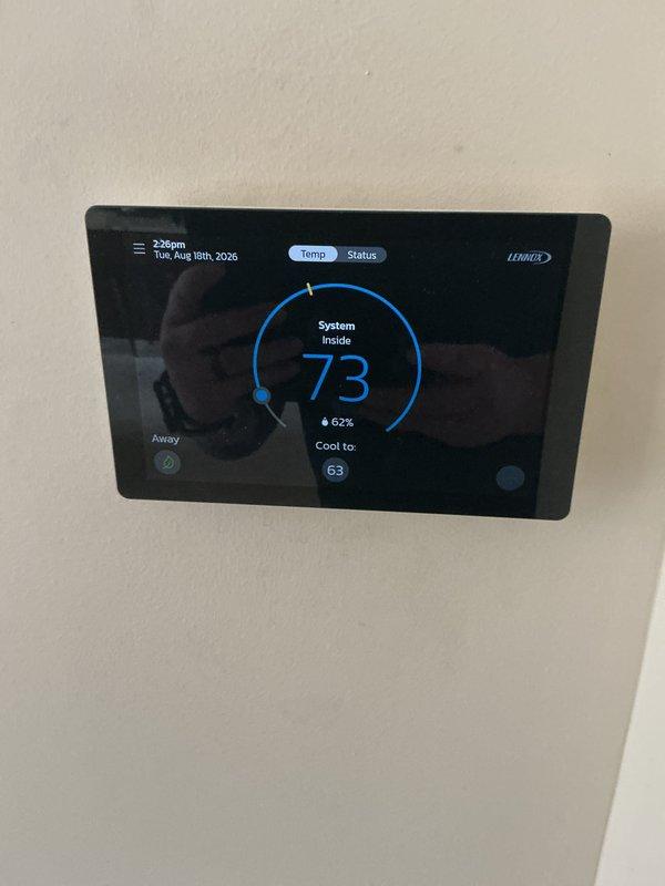 Completed comprehensive tune-up on 10-year-old Lennox air conditioning system. Performed full system diagnostics including electrical measurements with multimeter, verified thermostat operation and calibration at 73°F ambient with 62% humidity and cooling setpoint of 63°F. System operating within normal parameters with no deficiencies noted.