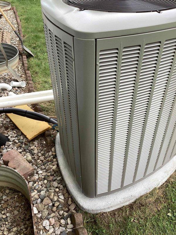 Completed full HVAC system installation including 90,000 BTU furnace, 3-ton Lennox air conditioning condenser unit with matching evaporator coil, and humidifier in rear yard location. System installed on concrete pad with proper refrigerant line connections, electrical hookup to existing meter, and reconnection of all necessary components. All equipment tested and operational upon completion.