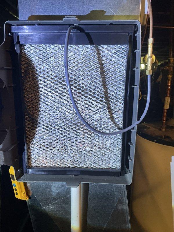 Completed scheduled air conditioning maintenance service including inspection of system components and thermostat operation. Replaced air filter and evaporative cooler pads as needed, verified system cooling performance at 72°F setpoint, and confirmed proper airflow through filtration assembly.