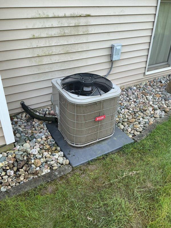 # HVAC Maintenance - ACM

Performed annual preventive maintenance on residential air conditioning system. Conducted comprehensive inspection of outdoor condenser unit, verified proper operation of compressor and condenser fan motor, checked refrigerant levels and system pressures. Inspected electrical connections at disconnect box and conduit runs, confirmed secure mounting on concrete pad. Verified condensate drain line functionality and cleared debris from unit exterior and surrounding area. System operating within manufacturer specifications with no deficiencies noted at time of service.