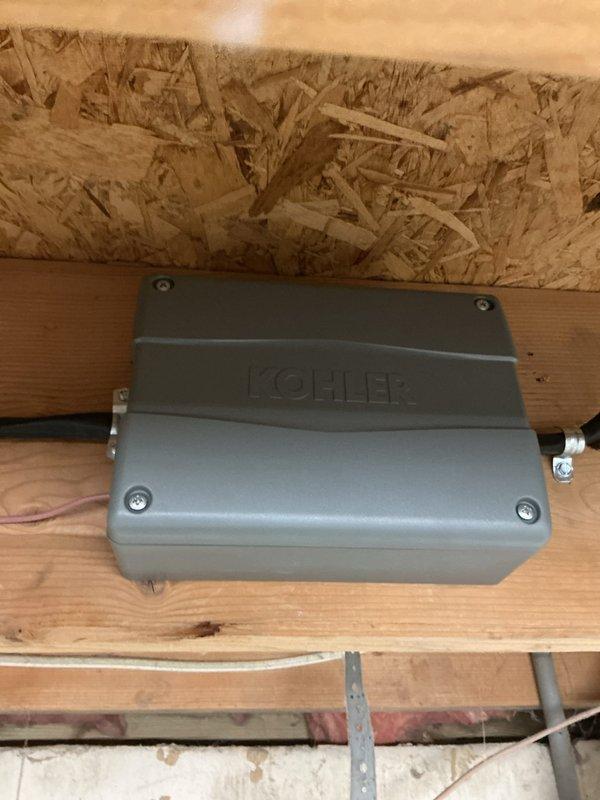 Successfully installed Kohler 20kW standby generator with complete electrical integration to existing 200-amp service panel. Installation included mounting generator transfer switch in interior utility space, running electrical conduit from transfer switch to generator location, and coordinating gas line installation with pressure testing to code requirements. All mechanical and electrical permits were obtained and work was completed per manufacturer specifications and local electrical code standards.