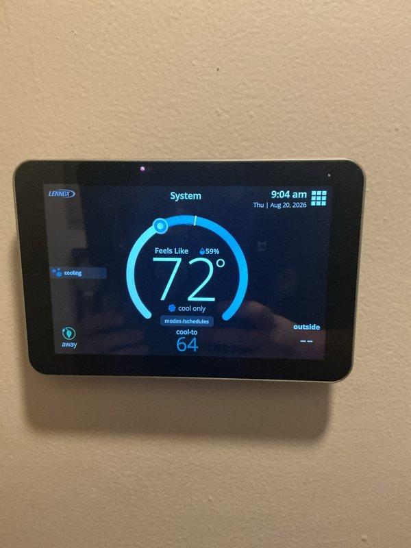 Completed annual cooling maintenance on Lennox HVAC system. Inspected thermostat operation showing proper functionality at 72° with system in cooling mode. Identified and documented debris accumulation in drain pan area requiring attention to prevent potential drainage issues and maintain system efficiency.