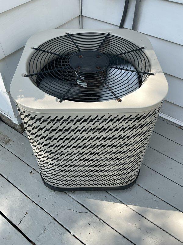 Completed routine maintenance on a 12-year-old residential air conditioning system with attic-mounted air handler and exterior condenser unit. Performed comprehensive tune-up inspection with no issues identified. System operating within normal parameters. Verified thermostat programming and temperature control functionality at 72 degrees. Inspected outdoor condenser unit including fan guard, coil grille protection, and mounting platform condition. All components found in satisfactory working order with no immediate service needs. System maintenance current through 2026.