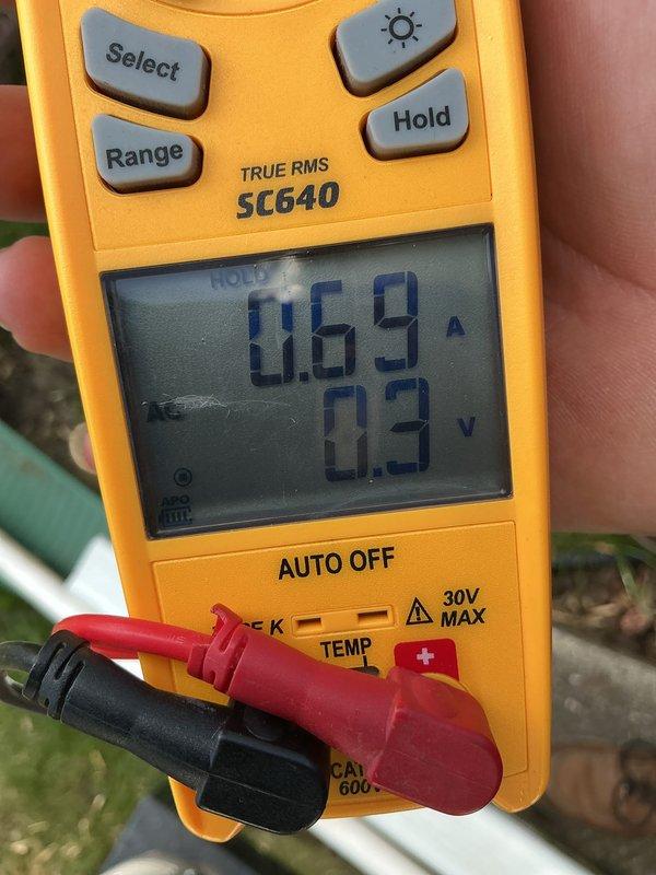 Performed comprehensive annual tune-up on 3-year-old air conditioning system. Conducted electrical diagnostics using digital multimeter, measuring amperage draw at 0.69A and voltage at 0.9V on tested components, with additional readings of 38.24 on system parameters. Inspected all major components including condenser unit, refrigerant lines, and electrical connections. System found operating within normal specifications with no deficiencies noted. All measurements confirmed proper operation and performance. Discussed available preventative maintenance plan options to ensure continued reliable system operation.