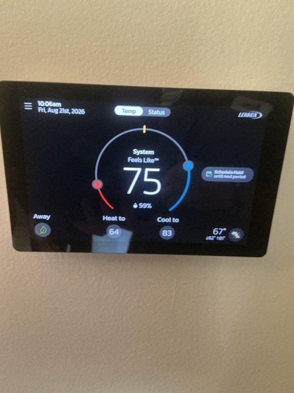 Completed routine maintenance and AC tune-up on a 6-year-old forced air furnace and air conditioning system. Inspected internal components including gas valve assembly, blower motor, electrical connections, and control wiring; all components found to be in proper working order. Verified Lennox thermostat operation and system settings, confirmed both heating and cooling systems functioning correctly with no issues identified.