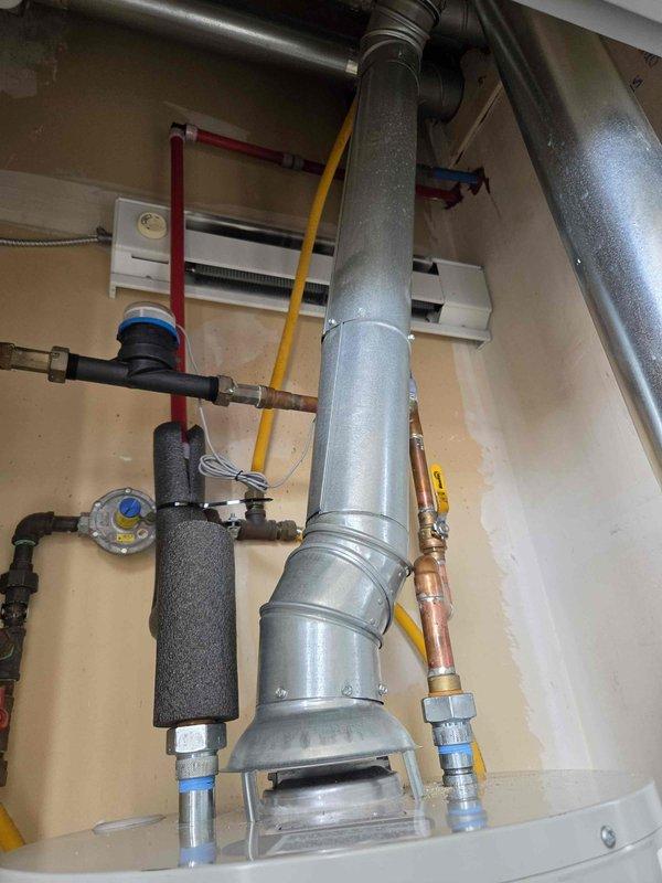 Completed installation of 51,000 BTU furnace (model RG140T6N) and water heater replacement with full system reconnection. Installed new galvanized ductwork with proper sealing and joints, connected gas lines with appropriate shutoff valves, and integrated insulated water supply lines with brass fittings. All mechanical work performed under permit requirements, system tested and operational upon completion.