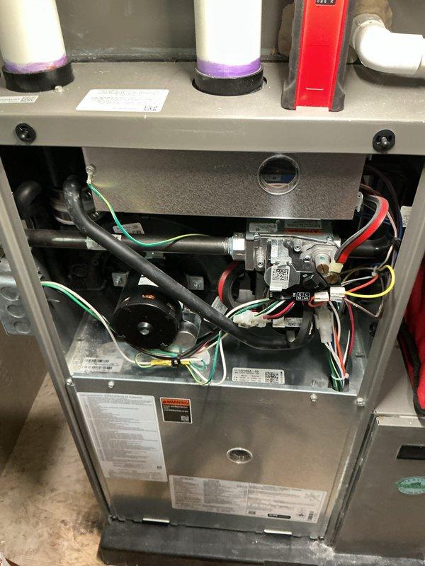Completed annual maintenance tune-up on residential furnace system. Performed comprehensive inspection of all mechanical and electrical components including gas valve assembly, blower motor, wiring connections, and safety controls. System was found operating properly with all components functioning within normal parameters; no repairs required at this time.