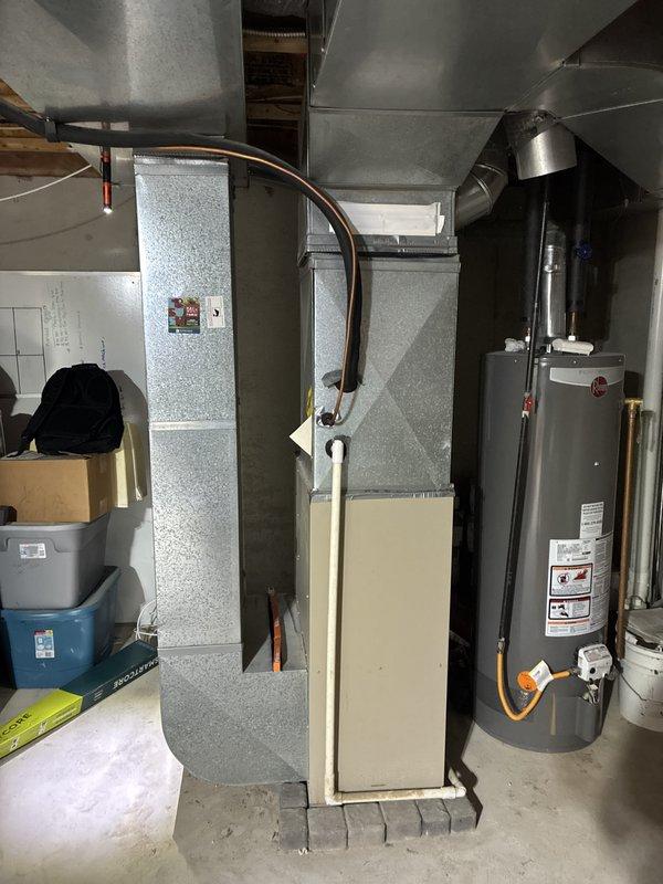 Conducted estimate for furnace replacement in basement mechanical room. Current gas furnace is non-operational and requires full replacement. Evaluated existing air handler installation, ductwork connections, and utility configurations including gas supply lines and electrical service. Documented equipment layout, clearances, and accessibility for replacement unit installation. Assessed venting requirements and existing infrastructure to determine proper sizing and specifications for new heating system.