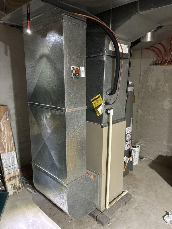 Conducted estimate for furnace replacement in basement mechanical room. Current gas furnace is non-operational and requires full replacement. Evaluated existing air handler installation, ductwork connections, and utility configurations including gas supply lines and electrical service. Documented equipment layout, clearances, and accessibility for replacement unit installation. Assessed venting requirements and existing infrastructure to determine proper sizing and specifications for new heating system.