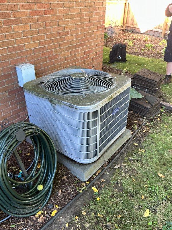 Completed comprehensive AC tune-up on 10-year-old Carrier system experiencing musty odor from supply vents despite proper cooling operation. Performed full preventive maintenance protocol including condenser coil cleaning to address visible algae growth on outdoor unit, evaporator coil inspection and cleaning, condensate drain line flush and treatment, air filter replacement, refrigerant charge verification, electrical connection inspection, and airflow assessment. Addressed humidity-related odor issue by treating drain system and verifying proper condensate removal. All components tested and confirmed operational within manufacturer specifications upon completion.