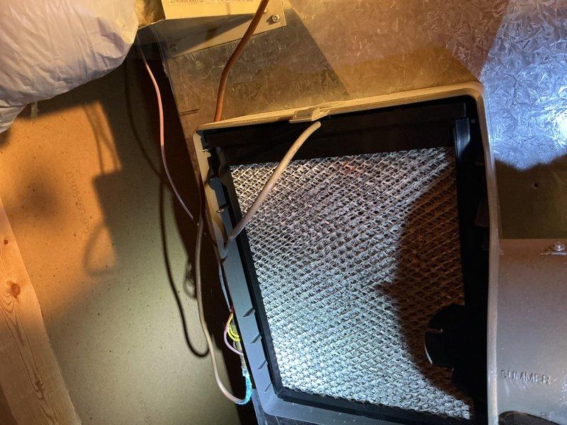 Completed comprehensive tune-up and maintenance inspection on 10-year-old residential air conditioning system. Performed multi-point system evaluation including thermostat functionality verification, air filter inspection and assessment, ductwork examination, and overall system performance testing. System found to be operating within normal parameters with thermostat displaying proper temperature readings and cooling cycle functioning correctly; filter showed typical dust accumulation for routine maintenance interval and was inspected for airflow efficiency.