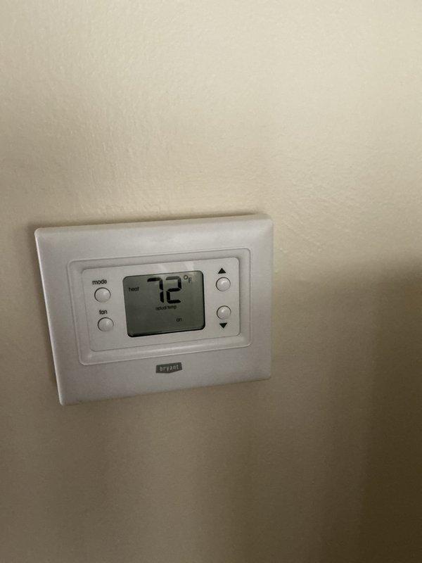 Completed routine annual maintenance on a 4-year-old air conditioning system and 15-year-old forced air furnace. Performed comprehensive inspection of all internal components including gas valve assembly, blower motor, heat exchanger, copper refrigerant lines, and electrical connections. Verified thermostat operation displaying proper temperature readings and system cycling. Inspected condensate drainage system, PVC vent piping, and all safety controls. Both systems operating within normal parameters with no deficiencies noted at time of service.