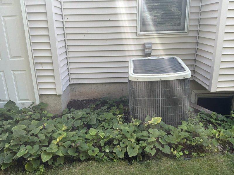 Conducted comprehensive site assessment for complete HVAC system replacement on residential property with 16-year-old furnace and air conditioning unit. Evaluated existing outdoor condenser unit positioned against exterior wall with adequate clearance and landscaping, inspected electrical service panel to verify circuit capacity and breaker configuration for new equipment installation. Discussed customer requirements for split-zone climate control system to provide independent temperature management between upper and lower floors, documented current system specifications and electrical infrastructure to develop tailored replacement proposal for dual-zone HVAC solution.