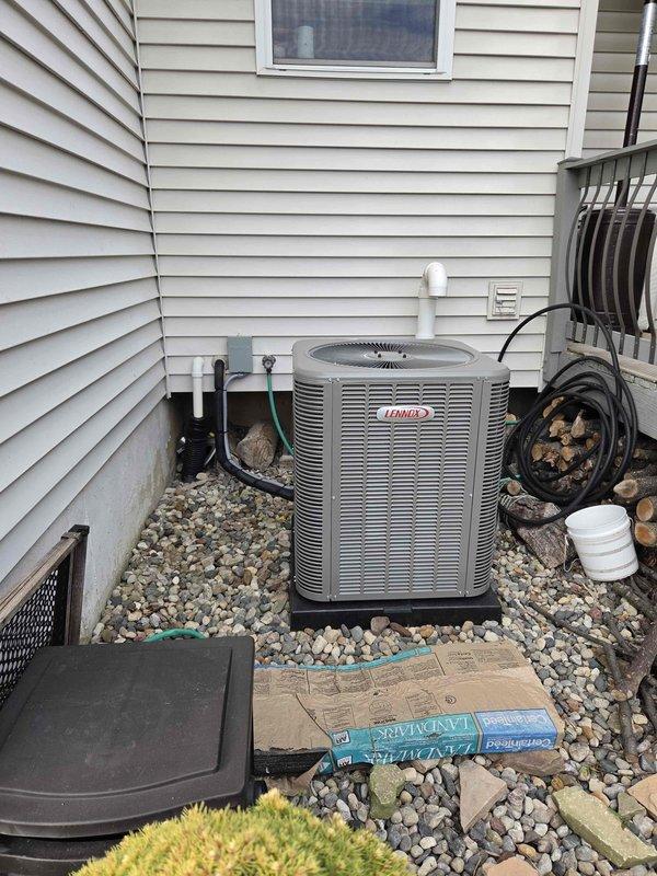 Completed full HVAC system installation including 70,000 BTU gas furnace with humidifier and 3-ton Lennox air conditioning unit with matching evaporator coil. Positioned outdoor condensing unit on equipment pad in rear yard location with proper clearances, installed refrigerant line set and condensate drain piping through exterior wall, and established all electrical connections. Reconnected existing ductwork to new furnace, verified proper airflow and refrigerant charge, and confirmed all equipment operational per manufacturer specifications.