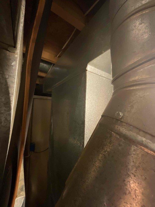 Provided estimate for complete HVAC system replacement including air conditioning unit and furnace for non-operational equipment originally installed in 1989. Assessed existing outdoor condenser unit on concrete pad and basement-located furnace with associated ductwork, documenting current system configuration and discussing available replacement options including promotional offers.