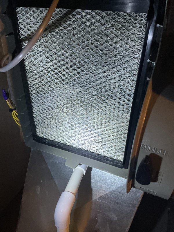 Completed routine preventive maintenance on HVAC system. Inspected existing air filtration system, including both the permanent washable mesh filter in the return air housing and the standard pleated disposable filter. Both filters showed moderate dust accumulation but remained functional. Verified proper filter installation and airflow pathways. System operational upon completion of maintenance inspection.
