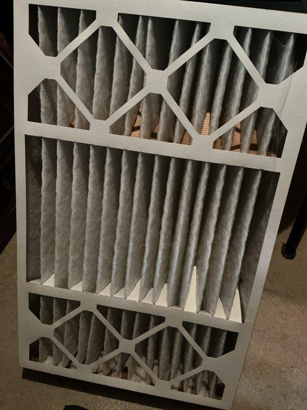 Completed routine preventive maintenance on HVAC system. Inspected existing air filtration system, including both the permanent washable mesh filter in the return air housing and the standard pleated disposable filter. Both filters showed moderate dust accumulation but remained functional. Verified proper filter installation and airflow pathways. System operational upon completion of maintenance inspection.