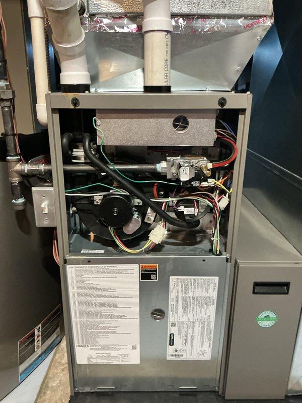 Completed routine tune-up maintenance on both a 5-year-old Bryant forced air furnace and a 25-year-old air conditioning system. Performed comprehensive inspection of all components including blower motor assembly, heat exchanger, gas valves, electrical connections, and control boards on the furnace unit, as well as full system evaluation of the AC unit. Both systems were found operating within normal parameters with no deficiencies noted; all safety controls tested and verified functional.