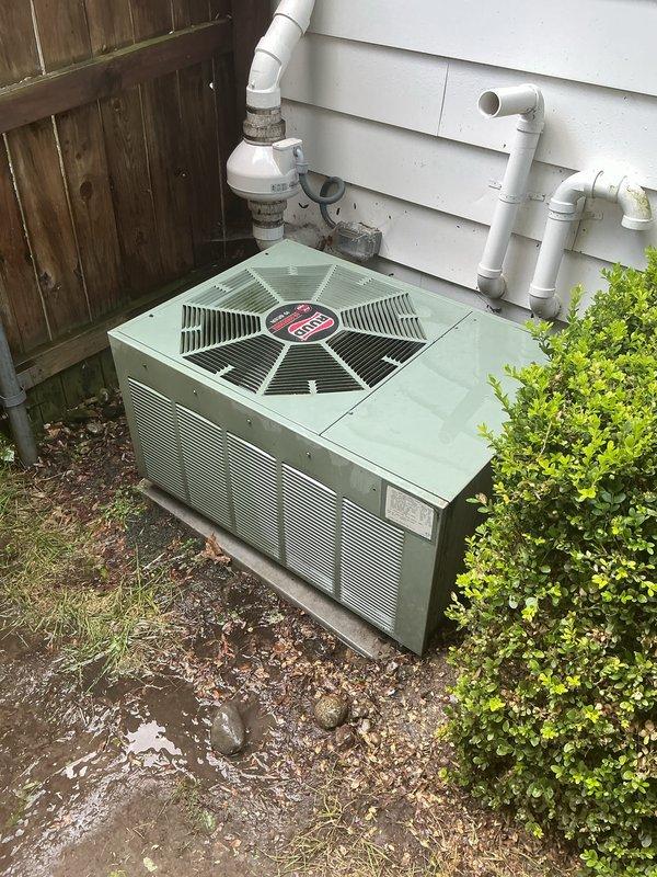 Performed comprehensive preventive maintenance on 20-year-old RUUD residential air conditioning system. Completed full AC tune-up including inspection of condenser unit, fan motor operation, electrical connections, refrigerant levels, and condensate drainage system. Cleaned condenser coils, checked all safety controls, verified proper airflow through louvers, and confirmed unit cycling and operational parameters within normal range. System operating as expected with no deficiencies noted at time of service.