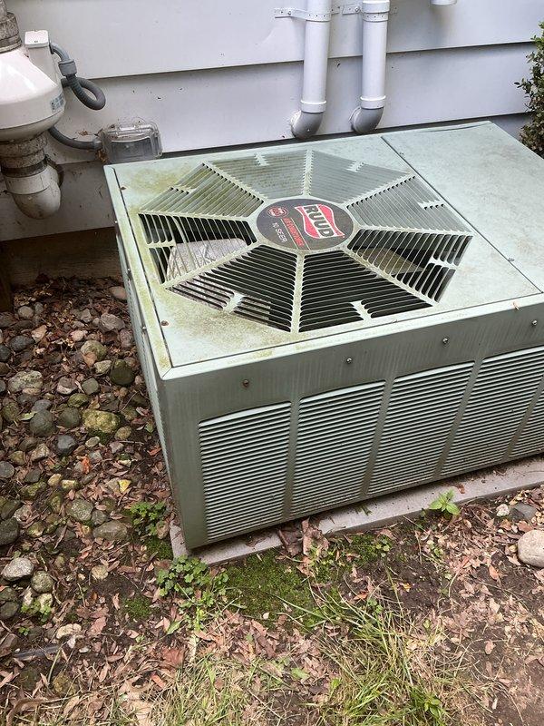 Performed comprehensive preventive maintenance on 20-year-old RUUD residential air conditioning system. Completed full AC tune-up including inspection of condenser unit, fan motor operation, electrical connections, refrigerant levels, and condensate drainage system. Cleaned condenser coils, checked all safety controls, verified proper airflow through louvers, and confirmed unit cycling and operational parameters within normal range. System operating as expected with no deficiencies noted at time of service.