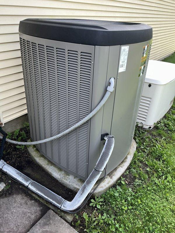 Completed seasonal air conditioning tune-up on 6-year-old residential system. Inspected outdoor condenser unit, evaporator coil, and refrigerant lines with basement access provided as requested. All components operating within normal parameters with no deficiencies identified.