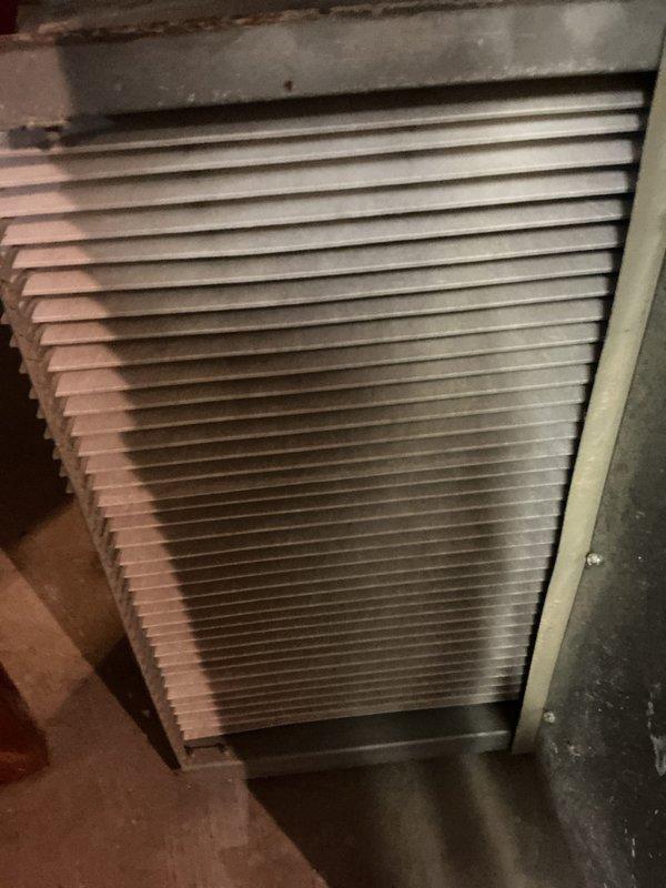 Completed scheduled AHC maintenance on residential HVAC system, including inspection of air handler components and burner assembly. Inspected return air grille, verified proper airflow through ventilation system, examined burner operation with visible flame pattern, and checked gas valve connections and electrical wiring for LP furnace unit.