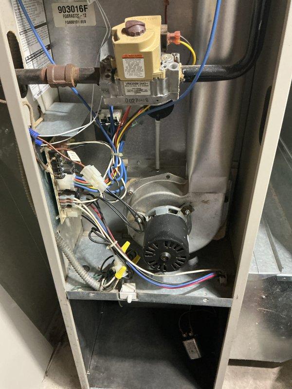 Completed comprehensive furnace tune-up and city rental certification inspection on basement-located heating system. Performed thorough examination of all internal components including gas valve assembly, ignition system, blower motor, heat exchanger, and electrical connections. Inspected and tested thermostat operation, humidifier functionality, and hot water tank condition as part of certification requirements. All components found operating within manufacturer specifications with no safety concerns identified. Unit cleared for continued operation and rental certification approved.