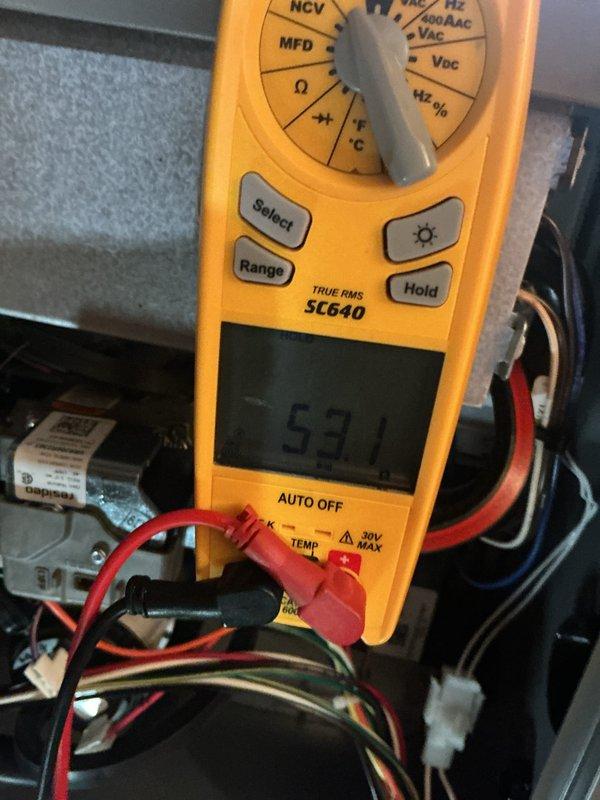 Completed routine AC tune-up and maintenance on 4-year-old Lennox system. Performed electrical diagnostics using multimeter, verifying proper voltage readings at 531V on system components. Inspected furnace interior components, blower motor operation, and electrical connections; confirmed all wiring secure and system operating within normal parameters.