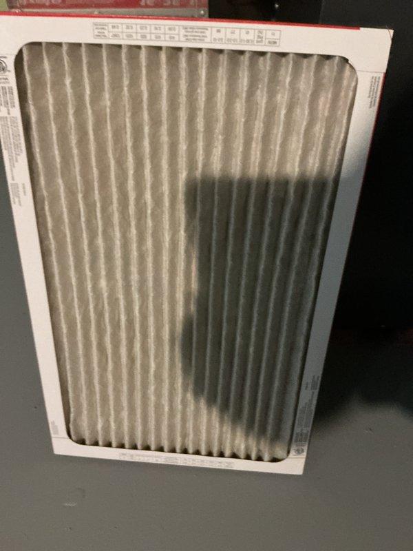 Completed routine AHM preventive maintenance service on HVAC system. Inspected Honeywell digital thermostat for proper operation and verified all control functions. Replaced heavily soiled air filter with accumulated dust and debris to restore proper airflow and system efficiency.
