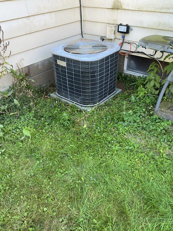 Completed routine preventative maintenance on residential air conditioning system. Performed comprehensive tune-up including inspection of condenser unit, verification of electrical connections at disconnect box, and assessment of overall system operation. Unit found to be functioning within normal parameters with no issues identified. Noted vegetation overgrowth around condenser unit that may impact airflow and future system efficiency if not addressed. All components inspected and system left in proper working condition.