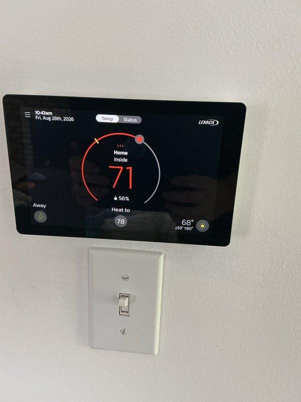 Completed comprehensive AC tune-up and furnace maintenance on a 3-year-old Lennox WT 10-2027 system. System was confirmed operational upon arrival with proper heating and cooling functionality. Performed standard preventive maintenance procedures including inspection of heating data specifications, verification of thermostat operation displaying 71°F current temperature with heat setpoint at 78°F and 56% humidity level, and documented all equipment specifications and operating parameters for maintenance records.
