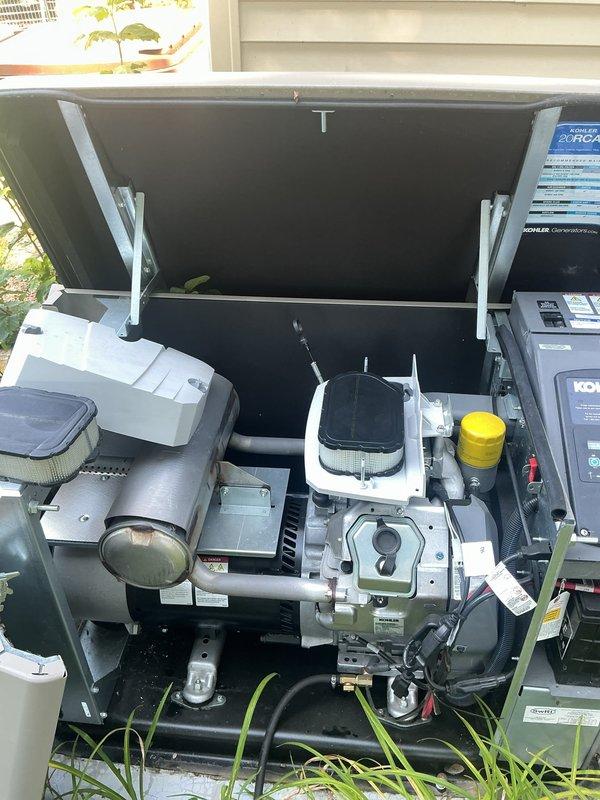 Completed routine electrical maintenance on a Kohler 20kW standby generator system. Performed comprehensive inspection of engine compartment, verified proper operation of AC output power breaker panel, and confirmed all control systems and electrical connections were secure and functioning correctly.