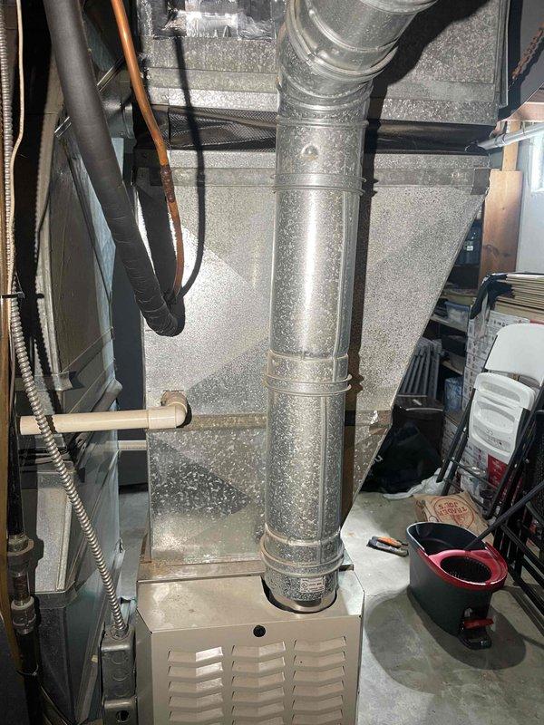 Conducted full system estimate for replacement of existing 16-year-old Bryant furnace and 16-year-old Luxaire air conditioning unit. Performed comprehensive evaluation of current HVAC system including ductwork measurements and inspection of existing equipment configuration in basement utility area. Documented system specifications, measured existing ductwork dimensions, assessed current installation setup including gas line connections, copper refrigerant lines, and air distribution components to provide accurate replacement recommendations for complete furnace and air conditioner system upgrade.