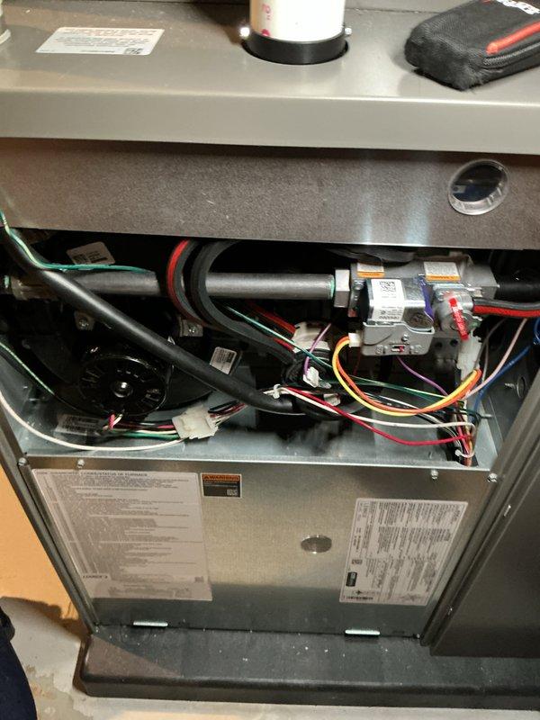 Performed comprehensive preventive maintenance on a five-year-old combined furnace and air conditioning system. Conducted thorough inspection of all mechanical and electrical components, including motor, capacitor, wiring connections, and drainage system. Verified proper operation of both heating and cooling systems, checked refrigerant levels, inspected condensate drain lines and PVC piping configuration, tested all safety controls, and confirmed system is operating within manufacturer specifications with no issues identified.
