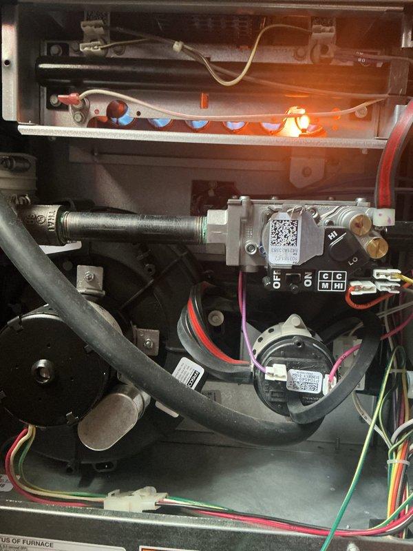 Completed comprehensive ComfortGuard maintenance package including full system inspection of furnace components, burner assembly, gas valve operation, and ductwork integrity. Verified proper ignition sequence, inspected all electrical connections and safety controls, and examined attic-installed flexible ductwork and insulation materials. All components found operating within manufacturer specifications with no deficiencies noted.