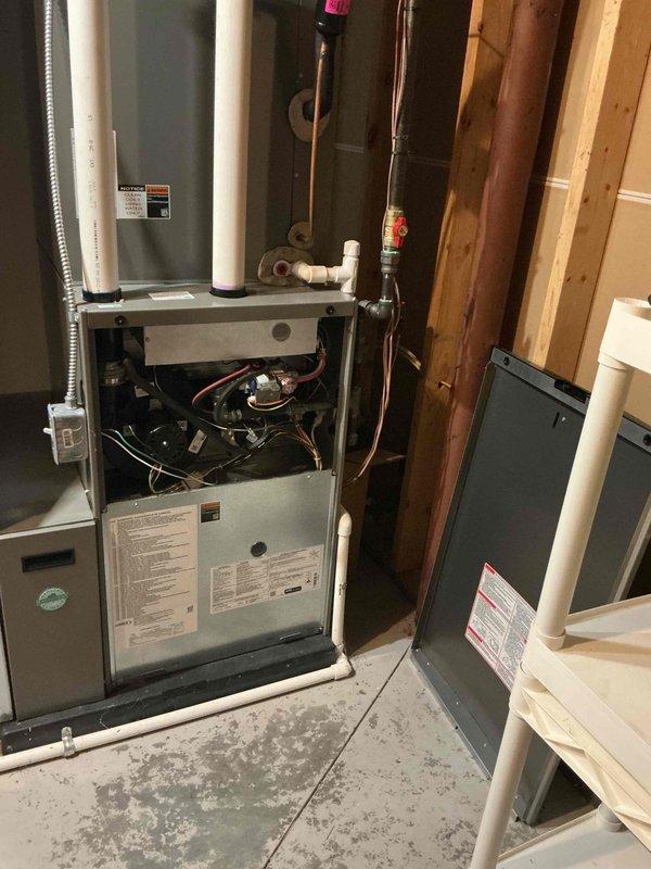 Performed warranty inspection and service on humidifier system installed with HVAC equipment in 2022. Accessed furnace cabinet to inspect humidifier unit and internal components, verified proper installation and operation of humidifier assembly. Removed and inspected humidifier water panel/evaporator pad, which showed signs of mineral buildup requiring replacement. Checked water supply line, saddle valve operation, and drainage system for proper function. Verified humidistat settings and electrical connections. Replaced water panel with new OEM component, reassembled unit, and tested system operation to confirm proper water flow and humidity output. Documented equipment with photos for warranty verification purposes. System restored to full operational status.