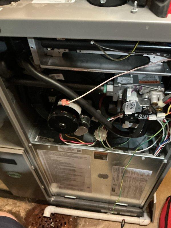 Completed annual heating maintenance on residential forced air system. Performed comprehensive inspection of furnace components including blower motor assembly, electrical connections, and control board. All wiring connections verified secure, blower motor operational, and internal components functioning within normal parameters. Unit tested and confirmed ready for heating season.