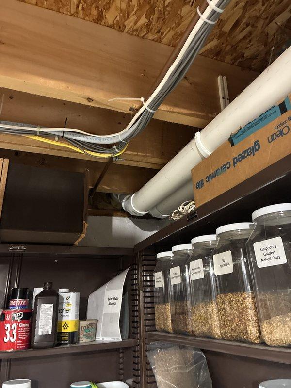 Provided comprehensive estimate for replacement of 22-year-old furnace and air conditioning system located in basement, with current A/C unit experiencing short cycling issues. Assessed existing equipment layout, electrical service panel capacity, and available space for new installation including proper clearances for ductwork and refrigerant lines. Documented site conditions and utility connections to prepare detailed proposal for complete HVAC system replacement with natural gas furnace and new condensing unit.