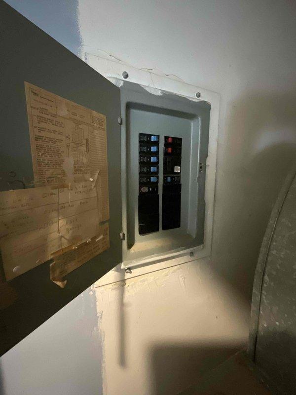 Provided replacement estimate for 30+ year old natural gas forced air furnace located in utility room off kitchen. Current unit operational but customer seeking proactive replacement for reliability during winter months. Evaluated existing installation including ductwork configuration, electrical service panel, and utility closet space constraints to determine appropriate replacement options focused on dependable mid-range equipment suitable for residential heating needs.
