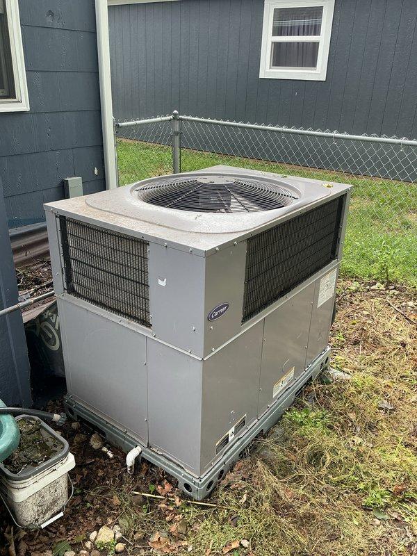 Performed comprehensive cooling season tune-up and maintenance inspection on Carrier heat pump system that had not been serviced in several years. Conducted complete system evaluation including refrigerant charge verification, electrical component testing, condenser coil cleaning, and airflow assessment. Unit was found operating within normal parameters with no immediate repairs required at time of service.