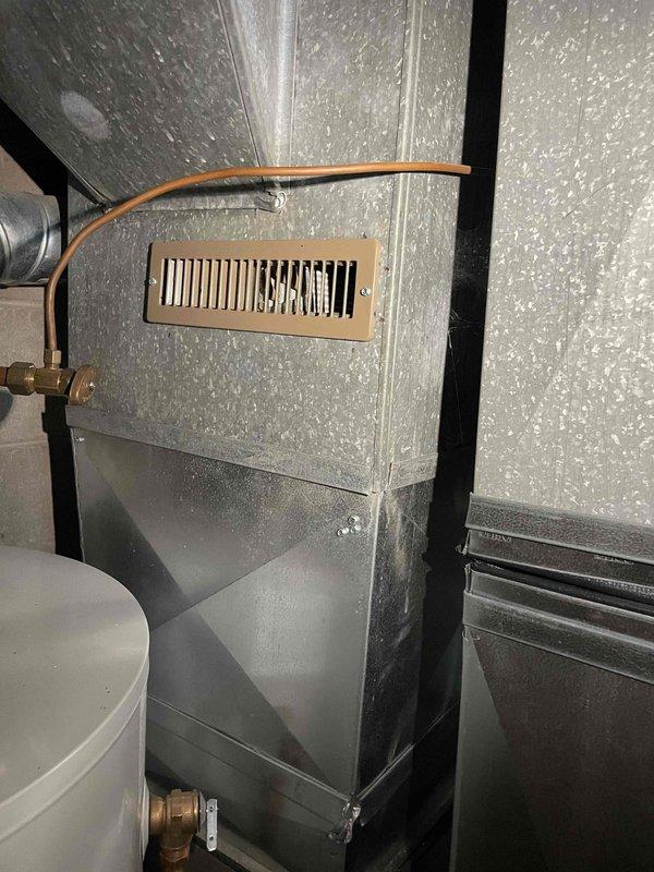 Provided comprehensive estimate for replacement of 26+ year old non-functional outdoor air conditioning unit. Assessed existing HVAC infrastructure including basement ductwork, plenum connections, and natural gas furnace integration to determine proper equipment sizing and installation requirements. Customer qualifies for Air Care Member discount on replacement system.