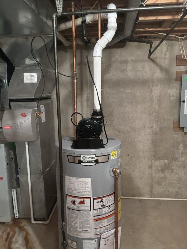 Provided estimate for complete furnace and air conditioning system replacement in basement location. Current equipment is original to home and operational but homeowner desires upgrade during upcoming vacancy period when tenant vacates. Assessed existing HVAC system configuration including furnace, air handler, ductwork, and thermostat control. Documented basement mechanical room layout with concrete walls, exposed ceiling joists, existing gray metal furnace unit with humidifier attachment, metal ductwork distribution, and electrical service connections. Reviewed natural gas fuel supply for heating system. Prepared comprehensive replacement proposal for modern high-efficiency heating and cooling equipment to improve comfort and energy performance.