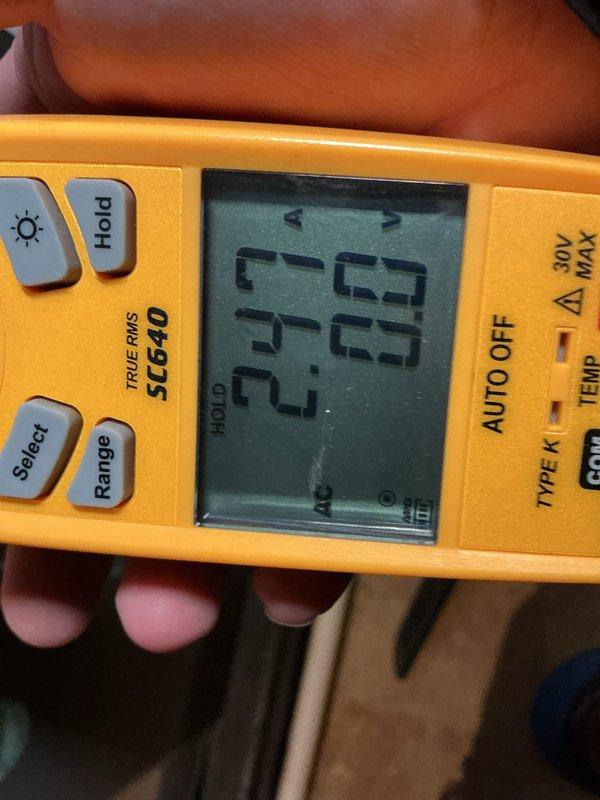 Performed comprehensive pre-winter tune-up and maintenance on residential HVAC system including both furnace and air conditioning unit. Conducted electrical diagnostics using digital multimeter to verify proper voltage readings of 503V and temperature measurements of 33.2°F at key system components, confirming all electrical connections and controls operating within manufacturer specifications. System inspected and found to be functioning properly with no issues identified; unit ready for heating season operation.