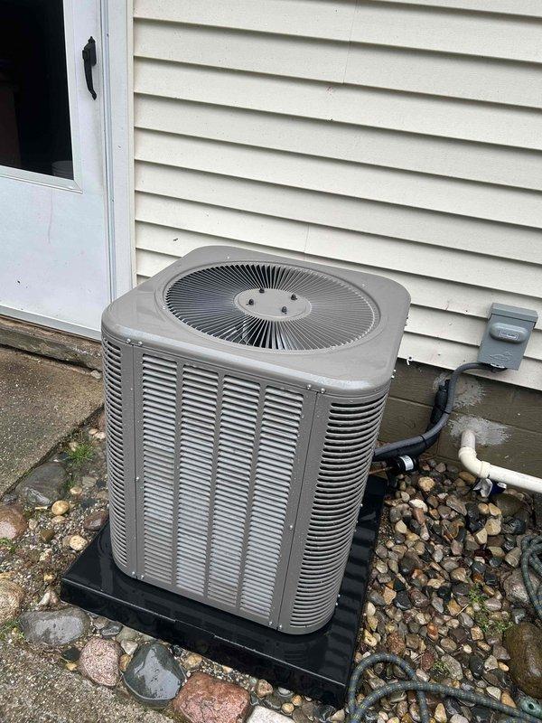Completed annual cooling maintenance on residential air conditioning system. Performed comprehensive inspection of outdoor condensing unit, checked refrigerant levels, cleaned condenser coils, verified proper airflow through louvered vents, inspected electrical connections and components, and replaced air filter as needed. Unit operating within normal parameters with no issues identified.