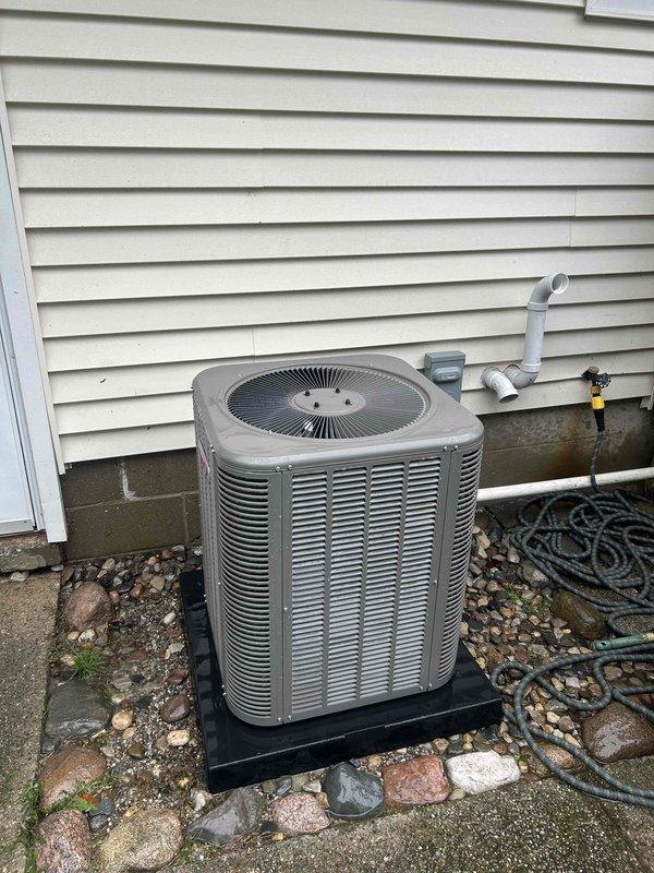 Completed annual cooling maintenance on residential air conditioning system. Performed comprehensive inspection of outdoor condensing unit, checked refrigerant levels, cleaned condenser coils, verified proper airflow through louvered vents, inspected electrical connections and components, and replaced air filter as needed. Unit operating within normal parameters with no issues identified.