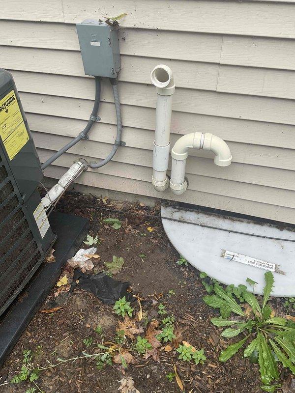 Provided estimate for replacement of 23-year-old natural gas furnace located in basement that is not operating properly. Assessed existing equipment configuration, venting system with PVC exhaust piping on exterior, and available space for new installation. Documented current system specifications and discussed replacement options with homeowner to restore reliable heating performance.