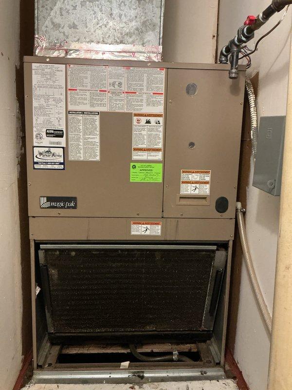 Returned to complete diagnostic on Magic-Pak HVAC system (Model: HWC9N4411P1B83B) that was not cooling. Found evaporator coil frozen over from previous day's visit. Completed troubleshooting to identify root cause of freezing condition and no cooling operation on basement-located unit over 10 years old.