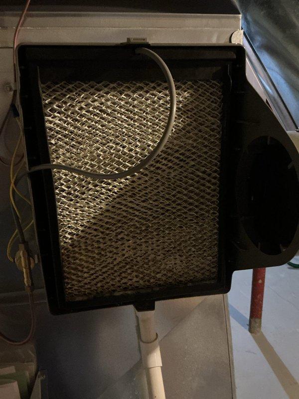 Completed comprehensive ComfortGuard maintenance service on residential HVAC system. Replaced heavily soiled air filter that exhibited significant dust and debris accumulation, which was restricting proper airflow through the system. Performed full system inspection including furnace unit, ductwork connections, condensate drain lines, and electrical components to ensure optimal performance and efficiency.
