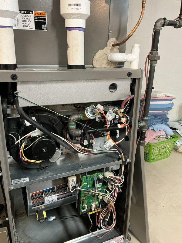 Completed annual HVAC maintenance on residential furnace system. Performed comprehensive inspection of all internal components including blower motor assembly, gas valve, control boards, electrical connections, and refrigerant lines. Cleaned and replaced air filter, verified proper operation of condensate drain lines, and confirmed all safety labels and warning stickers were intact and legible. All systems tested and operating within normal parameters.