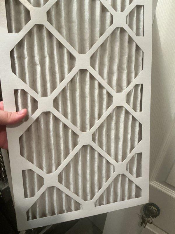 Completed annual heating and cooling maintenance service on residential HVAC system. Performed comprehensive system inspection, verified thermostat operation showing heat mode at 75°F room temperature with setpoint of 80°F, and replaced air filter with new pleated media filter to ensure proper airflow and system efficiency.